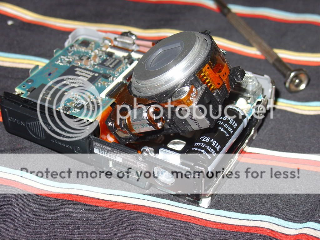 无基础经验试修sony dsc-w55快门关不紧问题